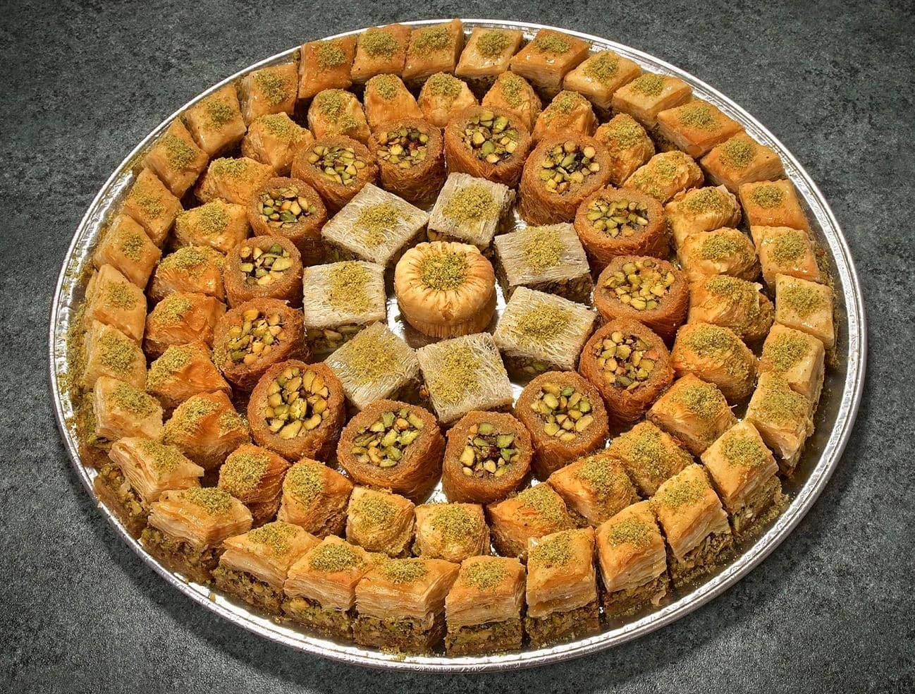 TRAY OF MIXED ORIENTAL SWEETS WITH NUTS - Image 1